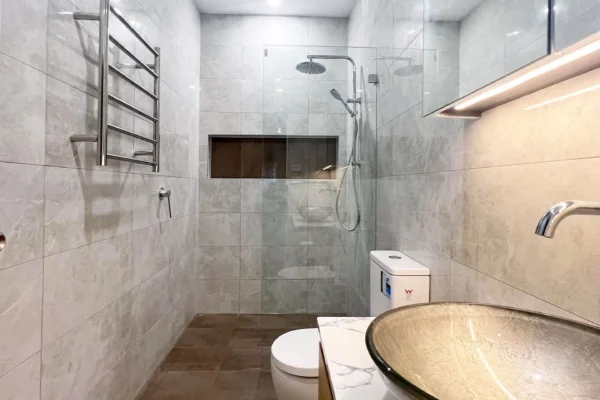 image of a bathroom with shower, bathroom fixture, toilet and bathroom vanity