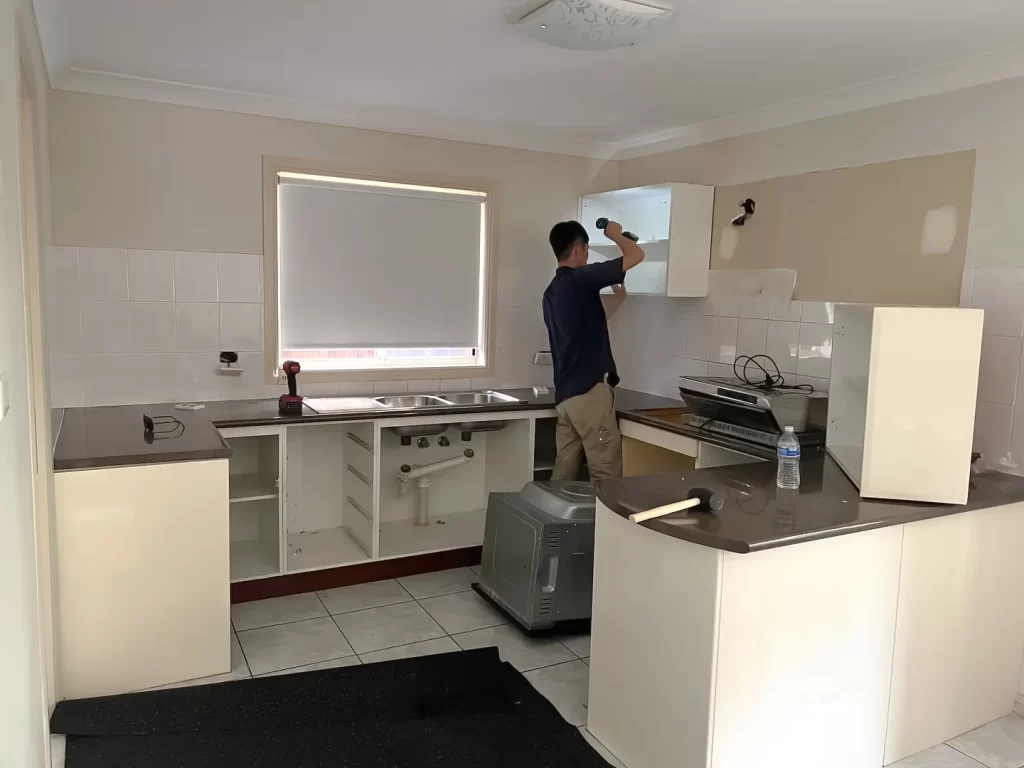 sample image of a man on work for topic about kitchen renovations sydney experts