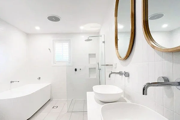 image of shower, bathtub with double bathroom vanity completed on curl curl bathroom renovations
