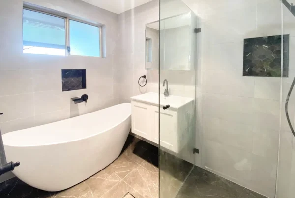 image of a bathroom with bathtub, shower and bathroom vanity that was completed on Bathroom Renovators Kenthurst