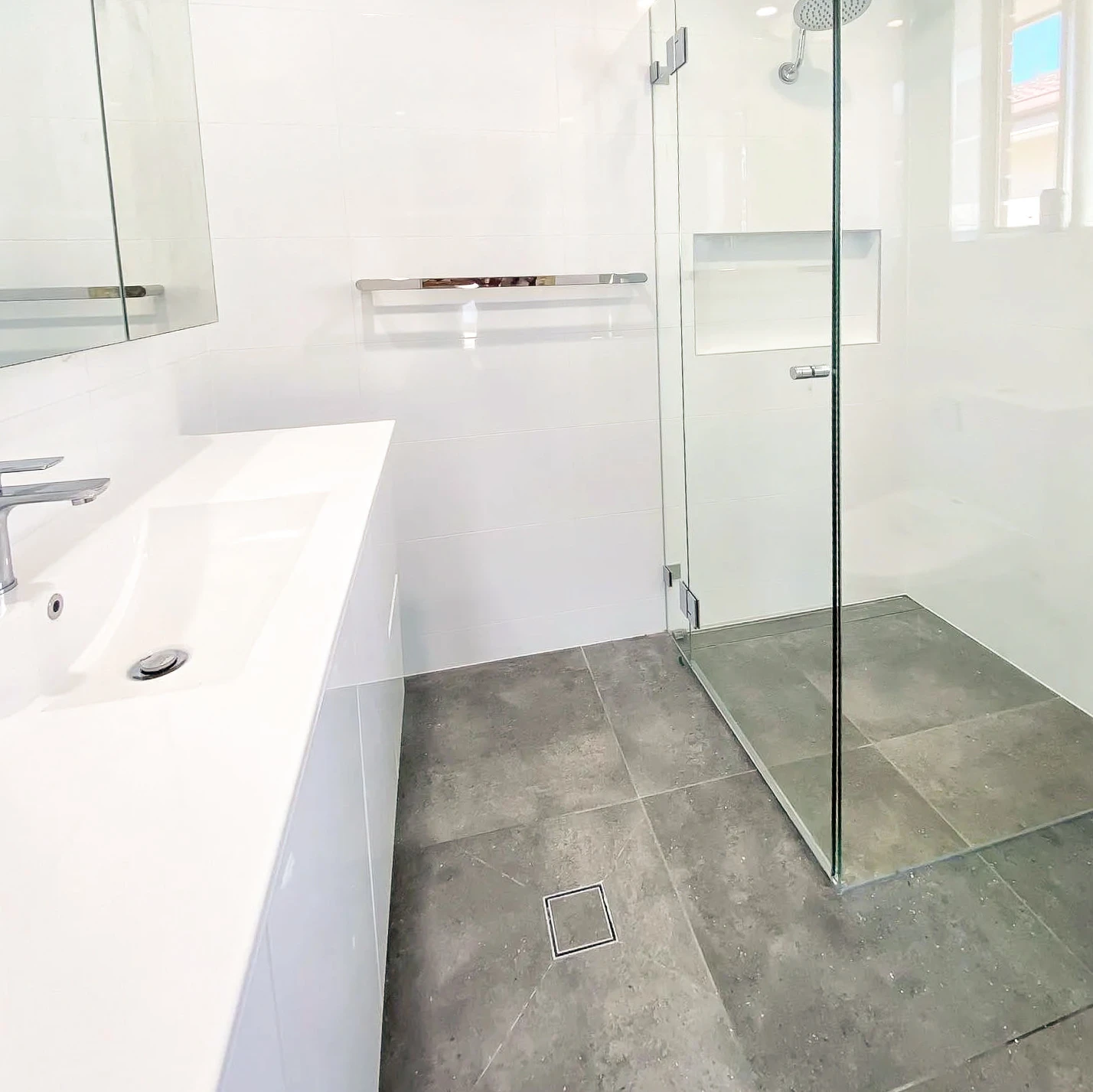 image of a bathroom with shower that was completed on bathroom renovations west hoxton