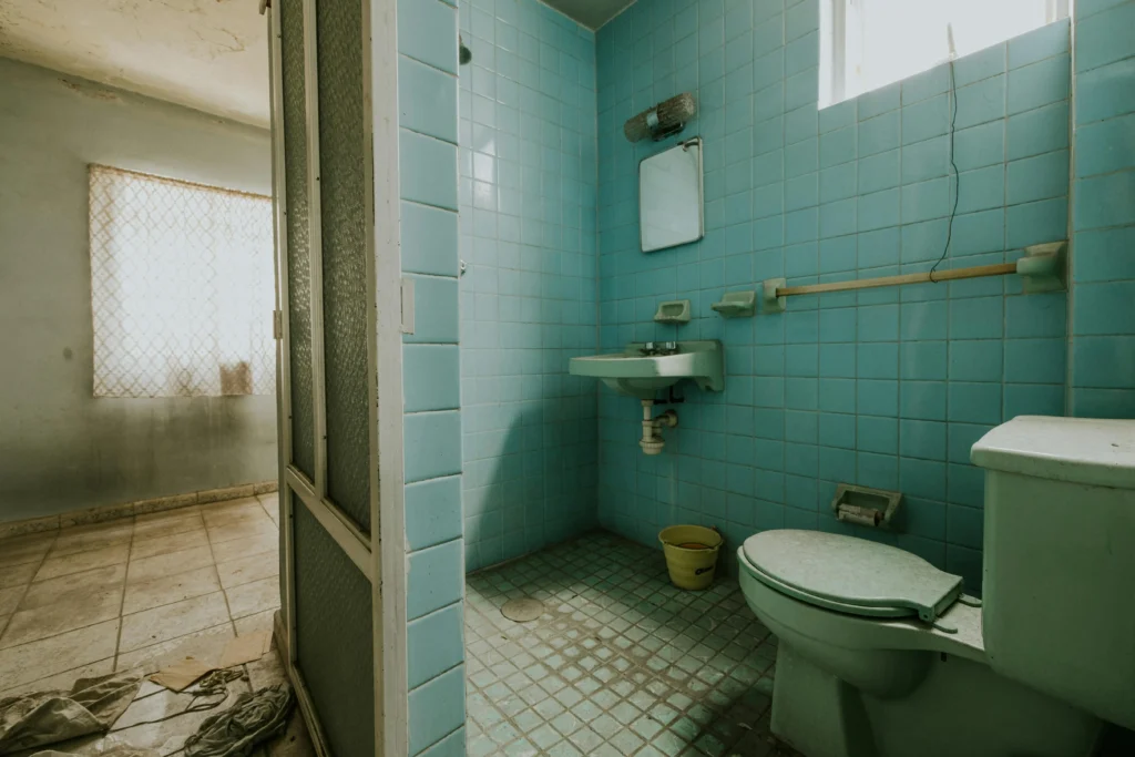 image of a damaged bathroom that needs renovation