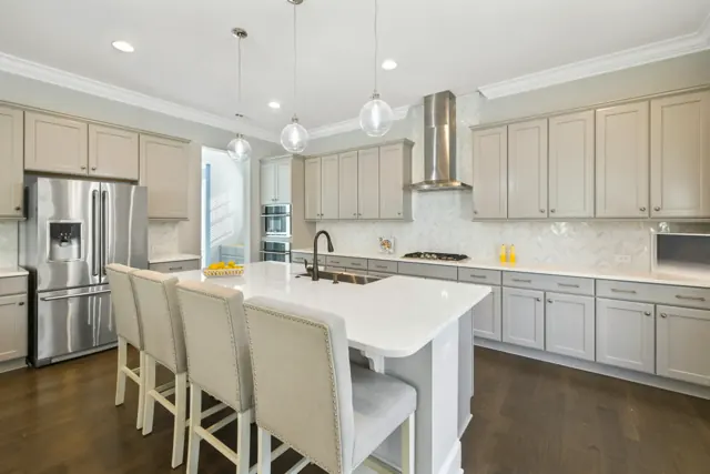Modern kitchen with island bench and pendant lighting